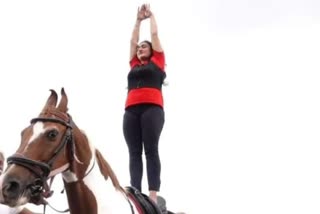 Indore Yoga Girl doing yoga while riding horse