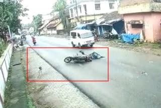 helmet saves bike rider life who fell on road in karawara