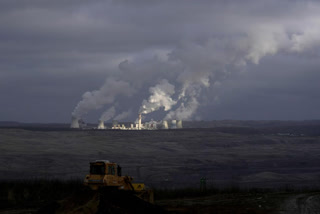 In climate fight, EU lawmakers back stricter emission caps