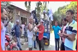 Aam Aadmi Party provides food to flood affected people in Nalbari