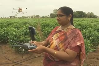 Woman farmer uses drone guntur