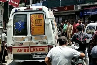 Ambulance with patient stuck in jam