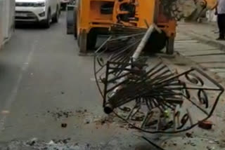 Iron ladder fell on car