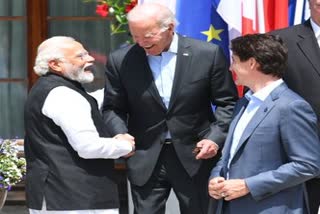 Joe Biden walks up to greet PM Modi