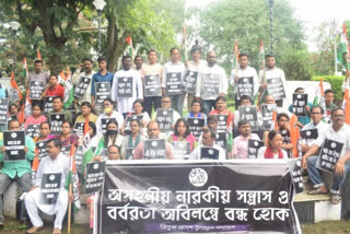 tmc silent protest against violence in tripura