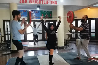 Weightlifting woman in Kashmir