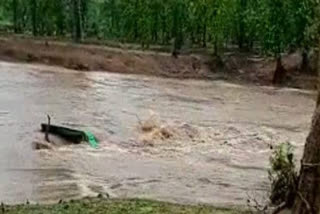 Tractor swept away in sudden flood