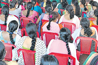 volunteers welcomes people for ysrcp plenary