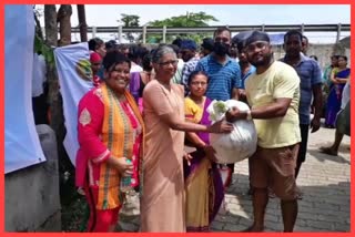 Women Development Centre distribute flood relief at Raha in Nagaon