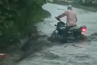 Dewas Bike Rider stuck in Drain