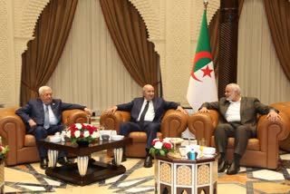 Palestinian president and Hamas chief hold meeting in Algeria