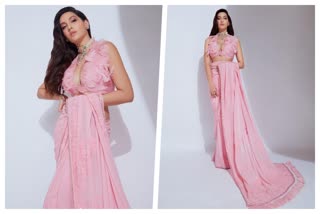 Nora Fatehi in pink saree  Nora Fatehi in saree  Nora Fatehi latest pics  Nora Fatehi pics  Nora Fatehi photos  Nora Fatehi latest news  Nora Fatehi  Nora Fatehi in manish malhotra saree