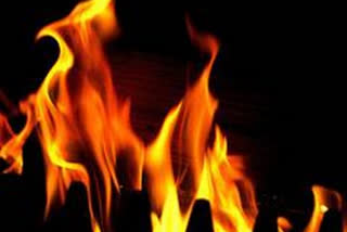 man burnt by villagers