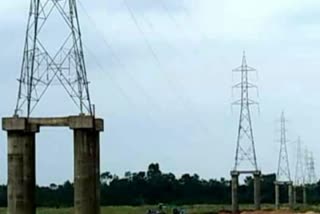 MP Electricity towers built in River