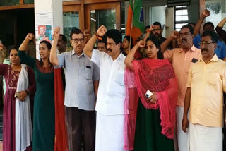 trivandrum corporation building number fraud  bjp protest at trivandrum corporation  temporary employees arrested at trivandrum corporation  trivandrum corporation bjp  തിരുവനന്തപുരം നഗരസഭ കെട്ടിട നമ്പർ ക്രമക്കേട്  കെട്ടിട നമ്പർ തട്ടിപ്പ്  ബിജെപി കൗൺസിലർമാർ പ്രതിഷേധിച്ചു