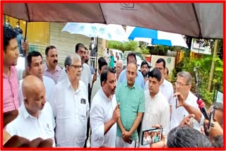 Former opposition leader Michael Lobo with supporters