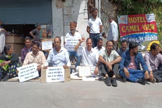 Protest against encroachment removal action
