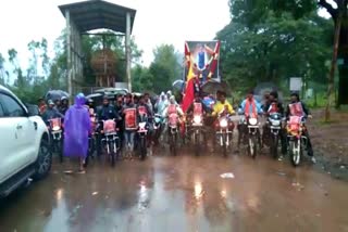 Bike rally by fans holding Kranti film posters