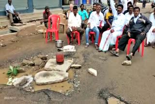 residents-protest-by-sitting-on-chairs-in-the-middle-of-the-road-in-shivamogga