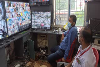 Dumka DC Ravi Shankar Shukla monitoring Basukinath temple from control room