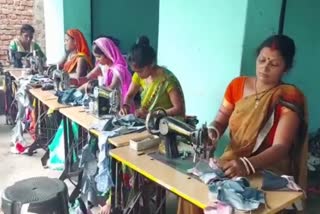 Women becoming self sufficient by making gloves in Bokaro