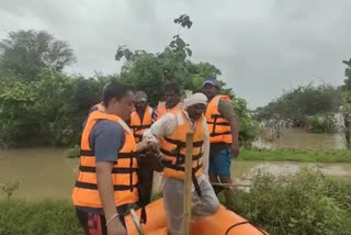 Farmers stranded atop a tractor rescued after 24 hours