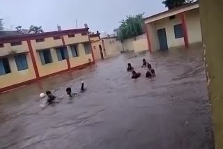 Children swam along with playing football in the play ground