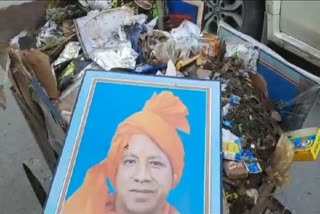 Modi, Yogi posters in garbage