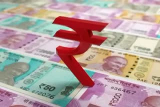 Rupee rises 20 paise against US dollar