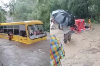 Bus submerged in water while crossing Sewer