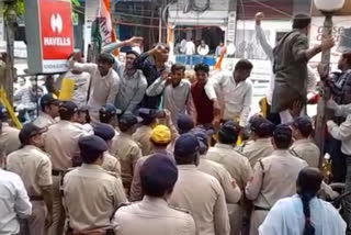 Youth Congress leader blackens ED office signboard in Indore; cops slap him