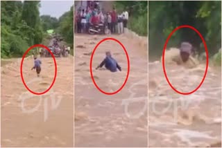 Man Washed Away While Crossing Flooded Road In Andhra