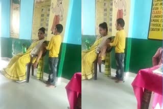 Viral video of teacher pressing hands