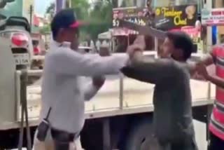 fight-between-traffic-police-and-security-guard-in-nagpur