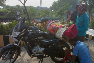 MP: Tribal man couldn't afford hearse; forced to carry mother's body on a motorcycle