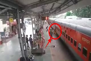 Woman slips while boarding a moving train