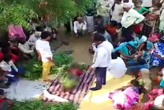 boy dead body taken out from grave in Aligarh