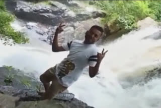 Viral Video: Man falls into waterfall while posing for camera