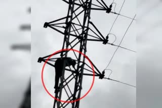 Man attempts suicide by climbing electricity tower