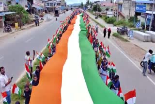 A huge national flag procession by school children