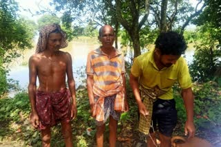 Father and son caught in flood