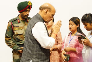 Rajnath Singh distributes cheque to deceased soldiers family on behalf of centre