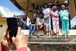 Indonesian villagers pull out and dress bodies to perform Afterlife Ritual