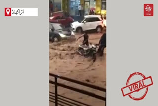 motorcycle-washed-away-in-rain-water-in-rishikesh