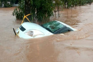 Two die as car and bike washed away in flood waters in Ramgarh