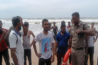 Police rescue man from sea in Bapatla District