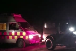 Pregnant ambulance stuck in debris