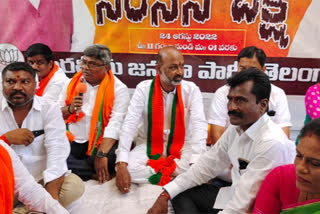 Bandi Sanjay protests at his residence in Karimnagar