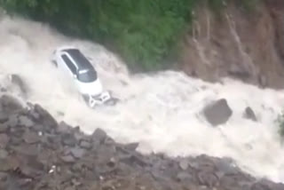 Car swept away in flood