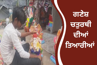 Idols of Lord Ganesha being made by artisans